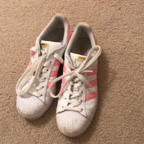 pink and white adidas superstars